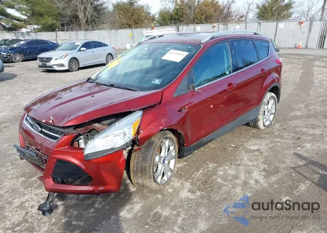 2015 Ford Escape Titanium z USA, uszkodzony, nr VIN 1FMCU9J96FUC85139